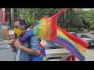 A group of activists protest against discrimination faced by gay couple in Caracas pizzeria