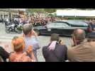 Hearse carrying late French actor Belmondo departs after ceremony