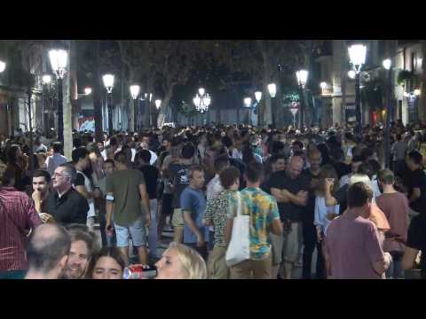 Crowds gather to drink in streets of Barcelona amid pandemic