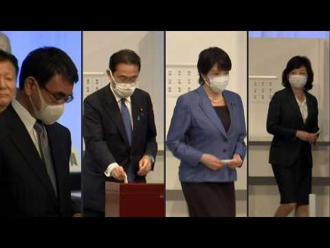 Japan ruling party candidates cast votes on next prime minister