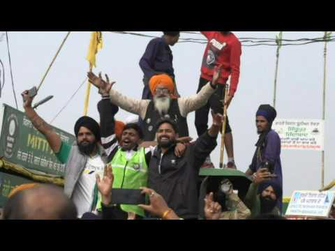 Celebrations at Indian farmers' protest site after Modi's U-turn