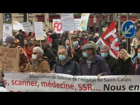 French protesters march to defend public health service
