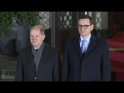 German Chancellor Olaf Scholz welcomed by Polish Prime Minister in Warsaw