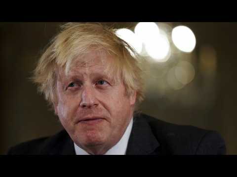 UK: MPs vote for new COVID measures, amid rebellion against PM Boris Johnson