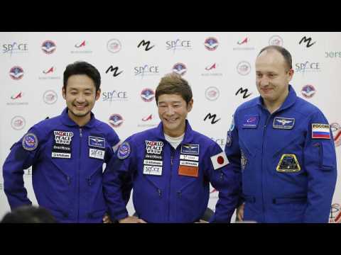 Japanese billionaire Yusaku Maezawa returns to Earth after 12 days on ISS