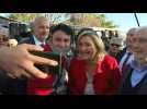 France's Le Pen greets residents at local market near Marseille