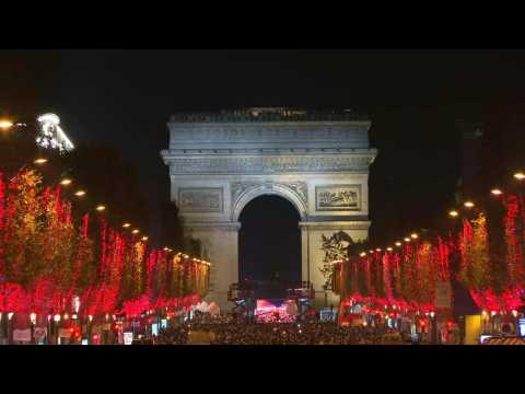 Champs-Elysees Christmas lights are turned on in Paris