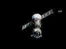 Russian spacecraft carrying Japanese billionaire docks at ISS