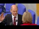 Olaf Scholz is sworn in as Germany's new chancellor - Label : AFPTV - First images - Category : News