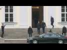 Germany's new Chancellor Olaf Scholz arrives at the President's residence