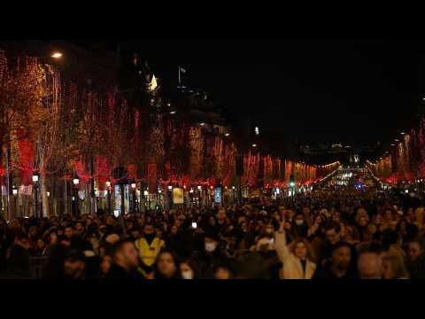 Christmas comes to the Champs Elysées as French pop star lights up Paris