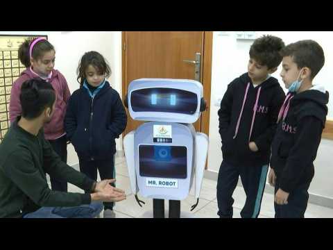Palestinian-made robot helps teach at Gaza school