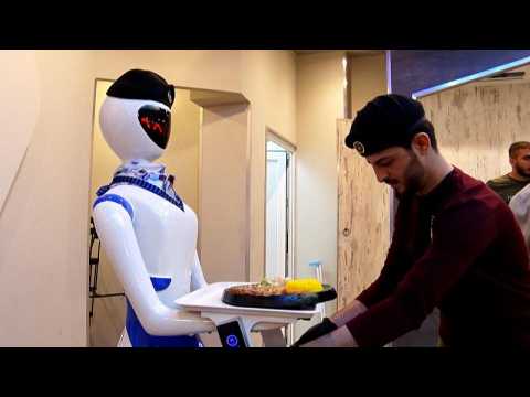 Robot waiters take Iraqis in Mosul into the future