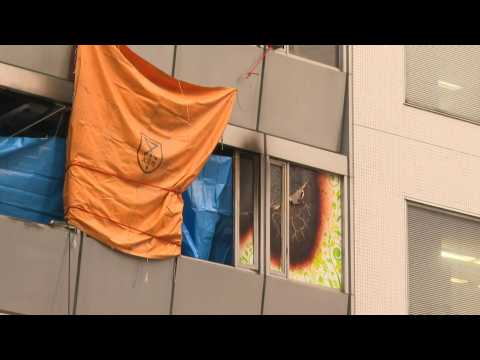 Japan: Aftermath scenes of building where 27 feared dead from fire