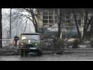 Ukraine soldiers remove bodies after Russian strikes on Kyiv TV tower