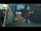 Crowds of Ukrainian refugees in Poland try to board buses