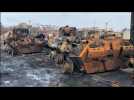 Russian military vehicles destroyed in Ukraine town