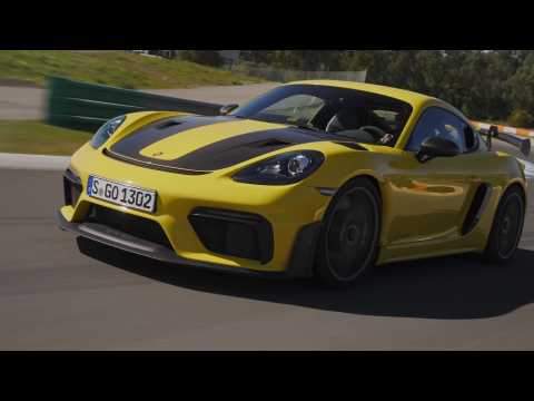 The new Porsche 718 Cayman GT4 RS in Racing Yellow Driving Video