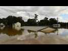 Watch floodwaters rise as parts of Australia receive almost a year of rainfall