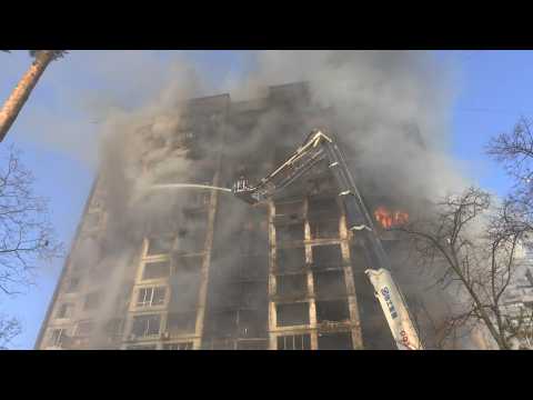 Ukraine firefighters battle flames on Kyiv high-rise