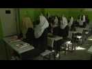 Afghan girls return to classroom as Taliban end ban