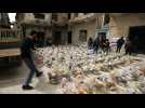 Syrians in Idlib receive food aid packages during Ramadan