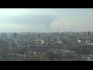 Smoke billows over Kyiv skyline
