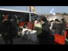 Ukraine refugees await buses after crossing into Poland - Label : AFPTV - First images - Category : News