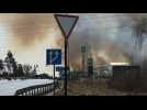 Smoke billows after Russian shelling north of Kyiv