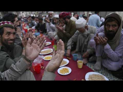 Muslims in Karachi break the fast on the first day of Ramadan
