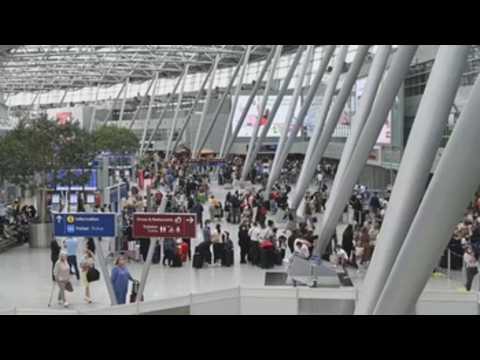Long lines at Düsseldorf International Airport at the start of the holiday