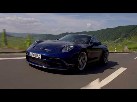 The new Porsche 911 GT3 with Touring Package in Blue Driving Video