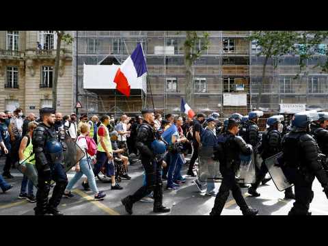 Tens of thousands protest against health pass in France