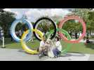 Tokyo 2020: People gather around Olympic stadium before opening ceremony