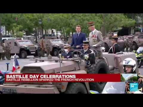 Emmanuel Macron arrives at the Champs Elysees for France's Bastille Day celebrations
