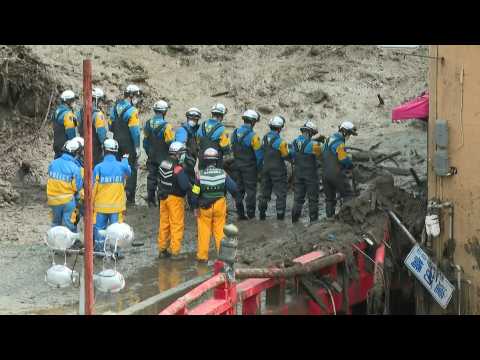 Rescuers continue search in landslide-hit Japan town