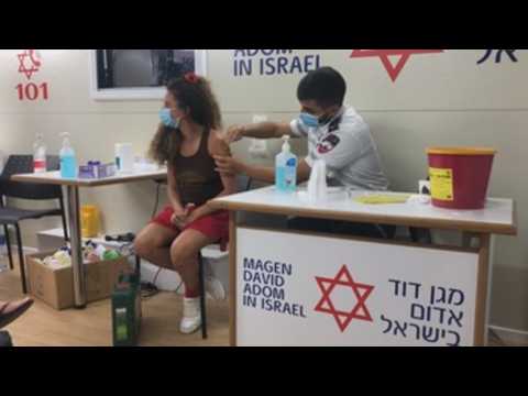 Teenagers get coronavirus vaccine in Tel Aviv