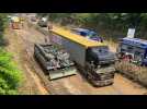 German army trucks attempts to clear roads after heavy floods