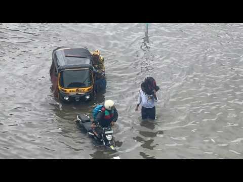 Roads flooded in Mumbai after heavy monsoon downpour