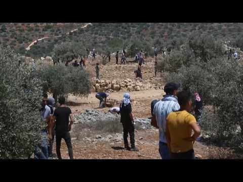 Palestinians clash with Israeli soldiers over Jewish settlement