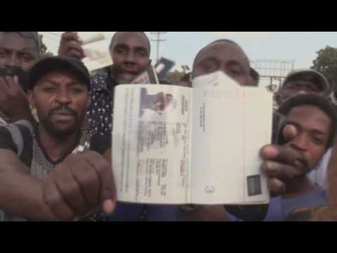 Hundreds of Haitians gather outside US Embassy to apply for visas