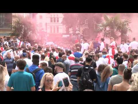 Excited England fans swarm in central London