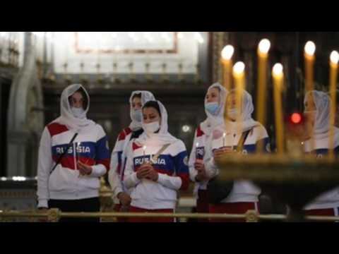 Russian Olympic team attends mass in Moscow