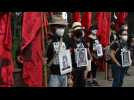 Guatemalans march in memory of the victims of the internal armed conflict