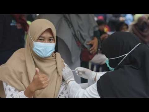 Indonesia accelerates vaccination drive amid new COVID-19 surge