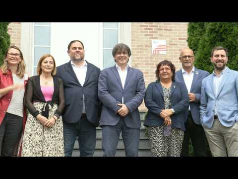 Recently released Catalan separatists visit former leader Carles Puigdemont