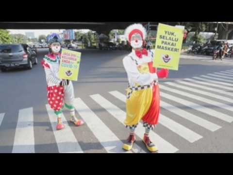 Clown show in Jakarta to raise awareness about Covid-19