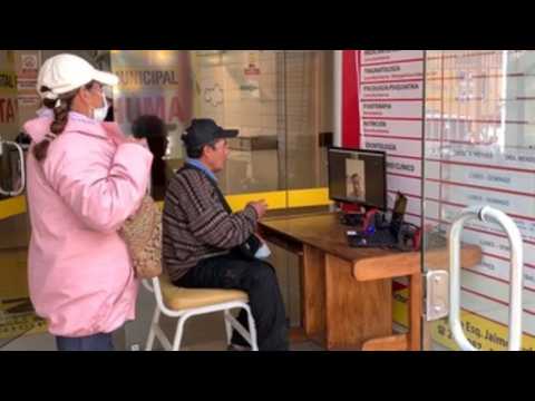 Video call booth brings relatives and Covid patients closer in Bolivia