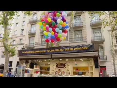 Old kiosks in La Rambla fight to survive while paying tribute to the movie 'Up'