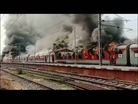 Protesters set trains on fire in India after new army recruitment plan unveiled